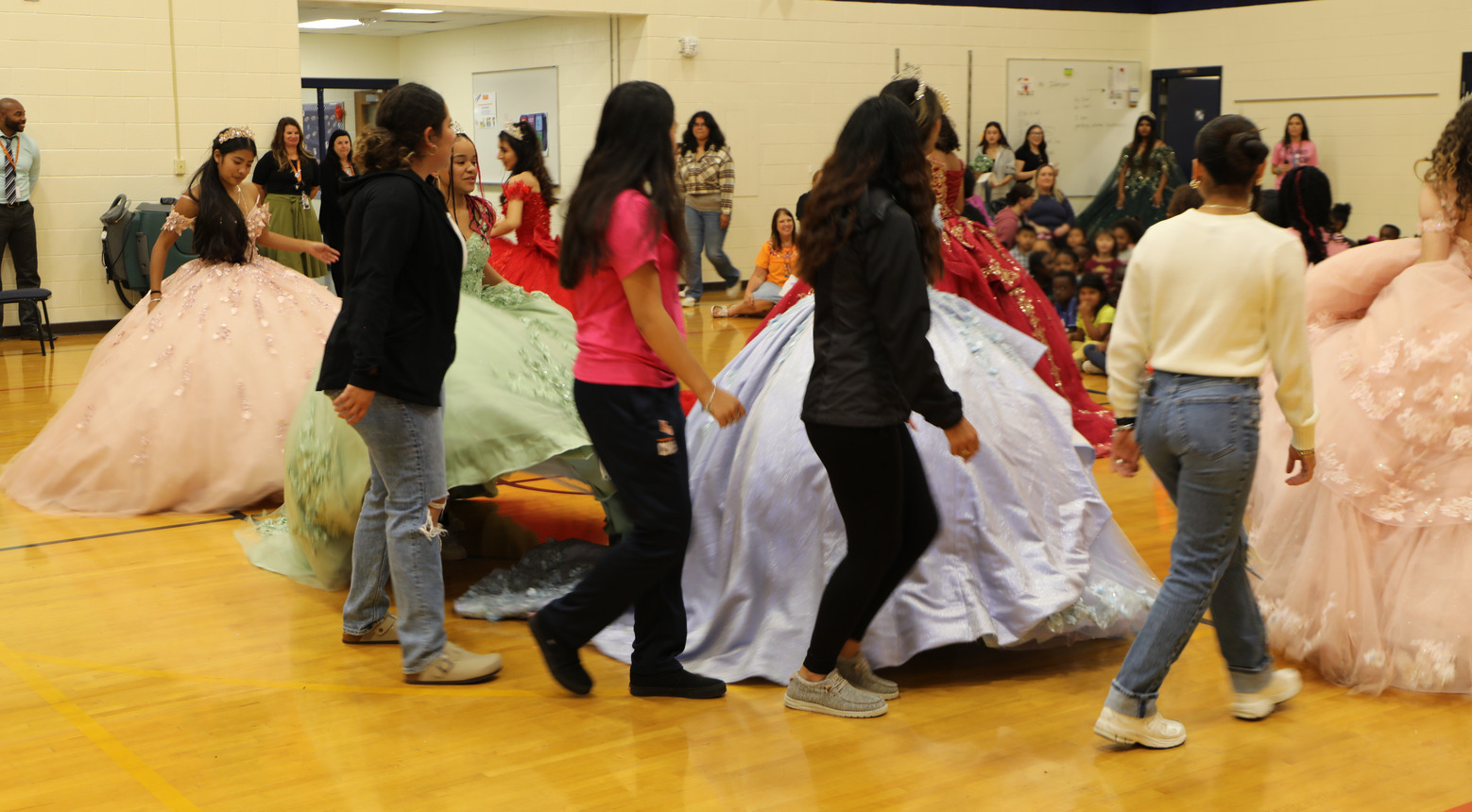 Students quinceanera dancing.